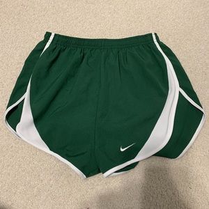 green nike shorts